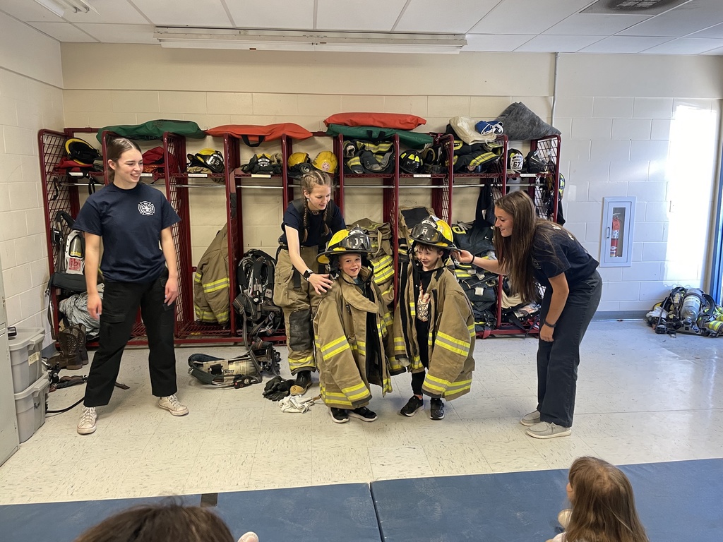 Fire Fighting Students Helping the Littles in ECOE